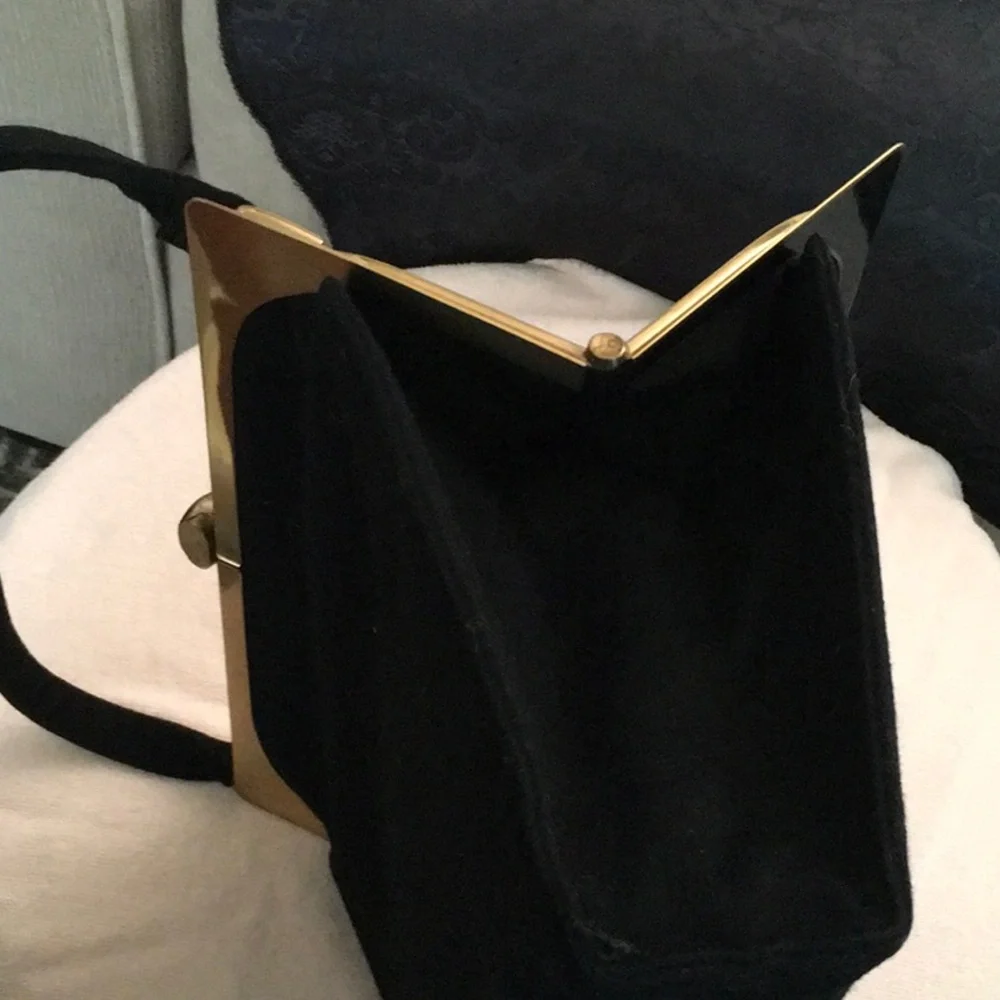 Classic Black Velvet Evening handbag with Gold Accent with fabric lining.